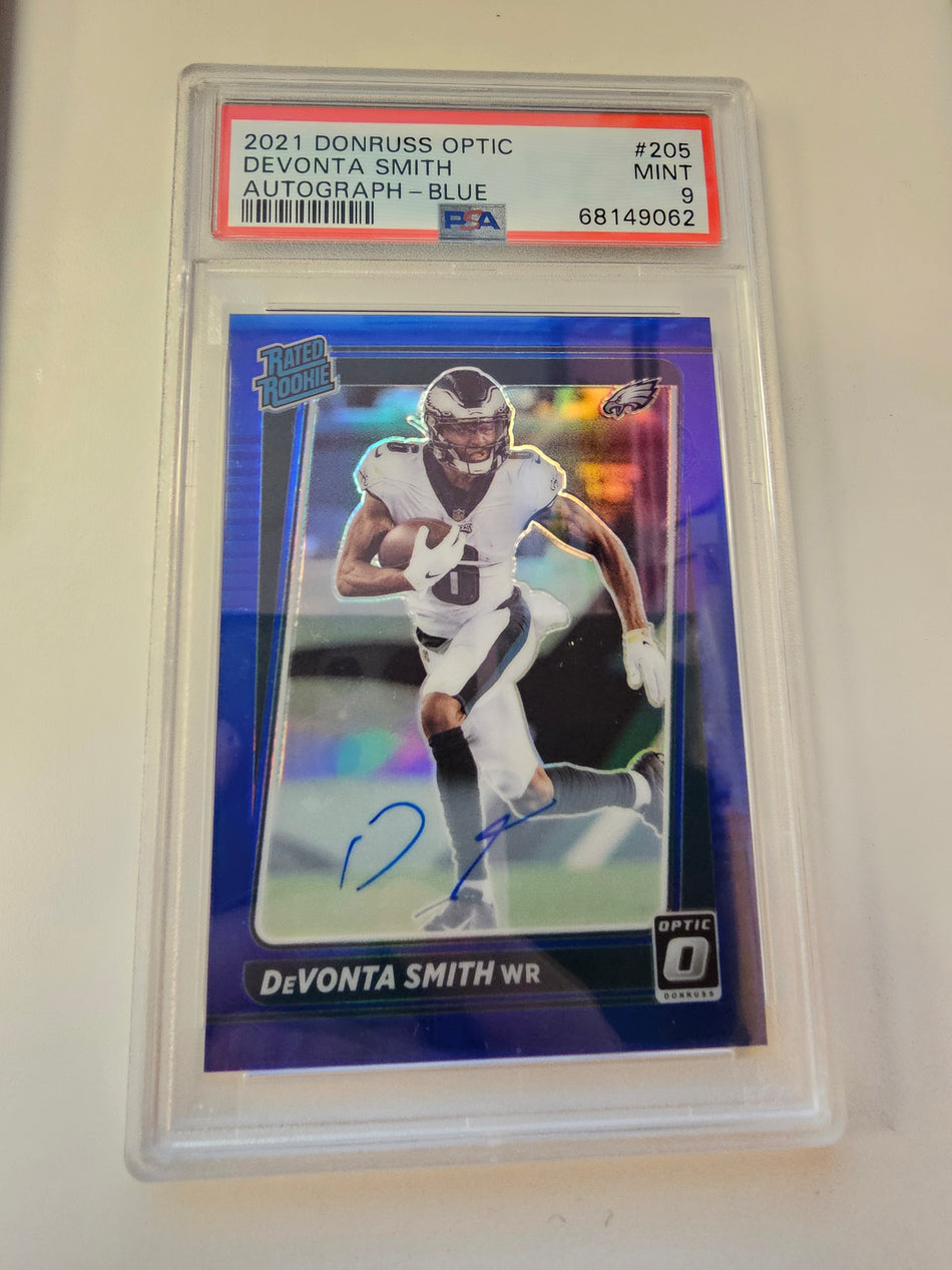 DEVONTA SMITH 2021 DONRUSS OPTIC RATED ROOKIE BLUE PRIZM RC AUTO /99 PSA 9